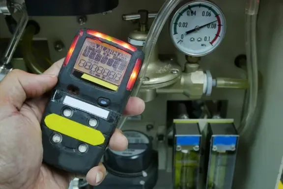 Radon testing meter in an Upstate NY basement